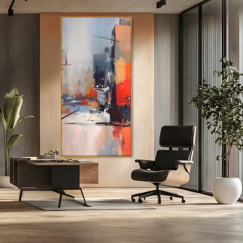 Tablou canvas cu pictura abstracta cu oras si cladiri, in rama de aluminiu auriu, pe perete intr-un birou